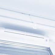 Grille de ventilation sur fenêtre PVC